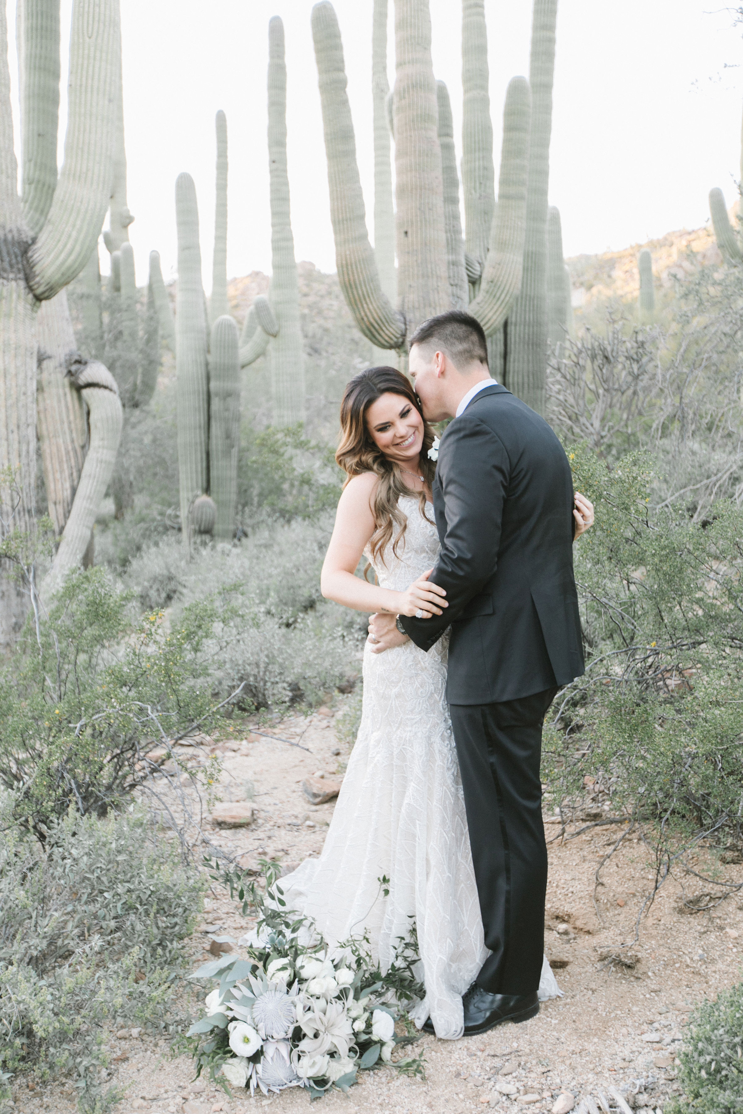 Wes and Erin's wedding at The Ritz Carlton Dove Mountain in beautiful Arizona. Get a closer look at KatinaPhotography.com #ArizonaWeddingPhotographer #RitzCarltonWedding #WeddingInspiration #DesertWeddingIdeas 